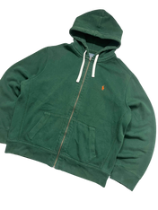 Zöld cipzáras kapucnis pulóver, elöl zsebekkel, vintage streetwear stílusban.