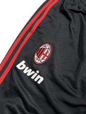 Fekete vintage AC Milan melegítő felső piros csíkokkal és hímzett klub logóval