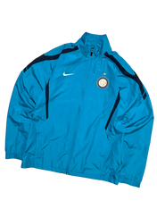 Kék Nike vintage melegítő felső, Inter Milano logóval, cipzáras, sportos streetwear stílus