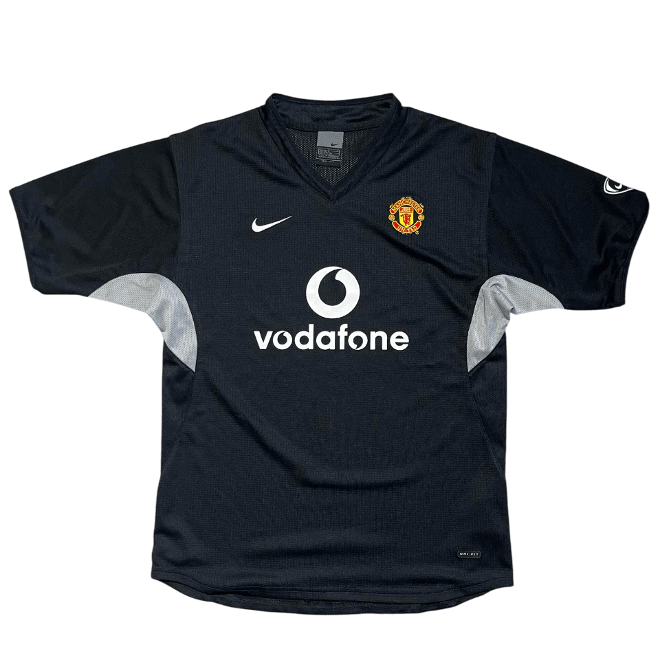 Fekete vintage Nike Manchester United focimez Vodafone logóval, streetwear stílus