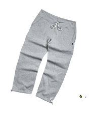 Világosszürke vintage melegítőnadrág zsinóros derékpánttal, oldalzsebekkel, streetwear stílusban